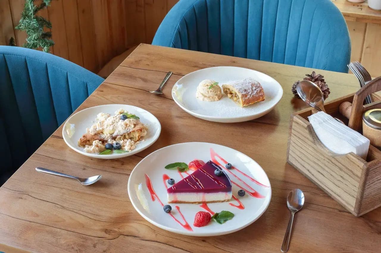 Cheesecake, strudel and curd cheese with berries